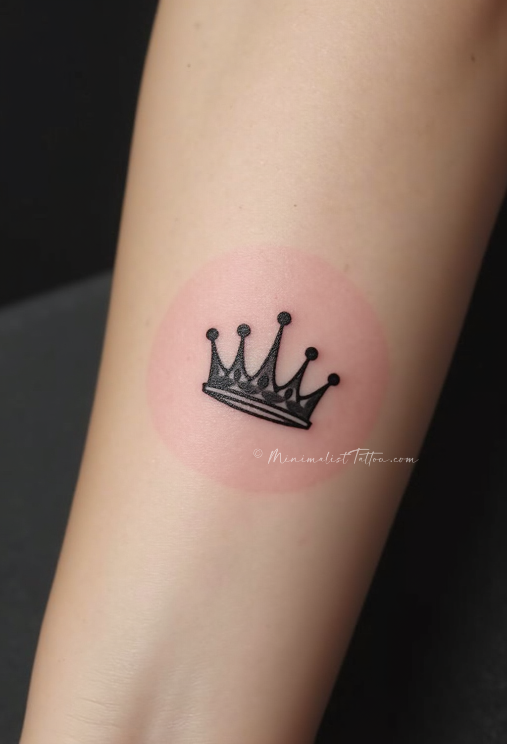 Minimalist crown finger tattoo