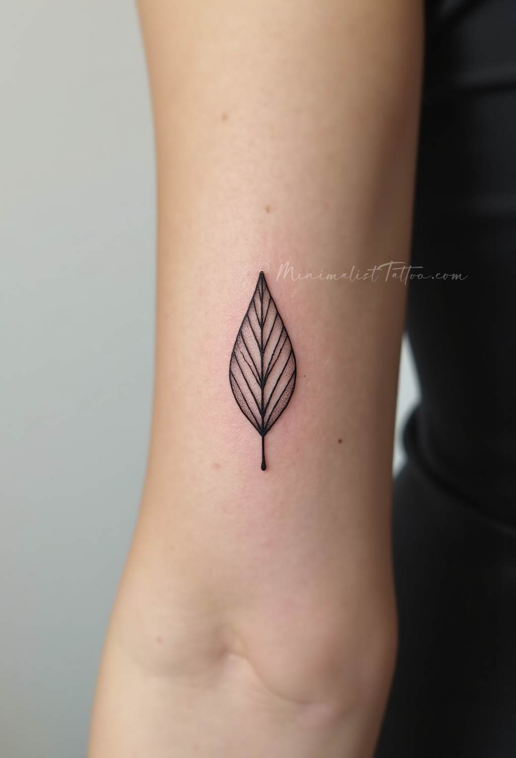 Small leaf tattoo