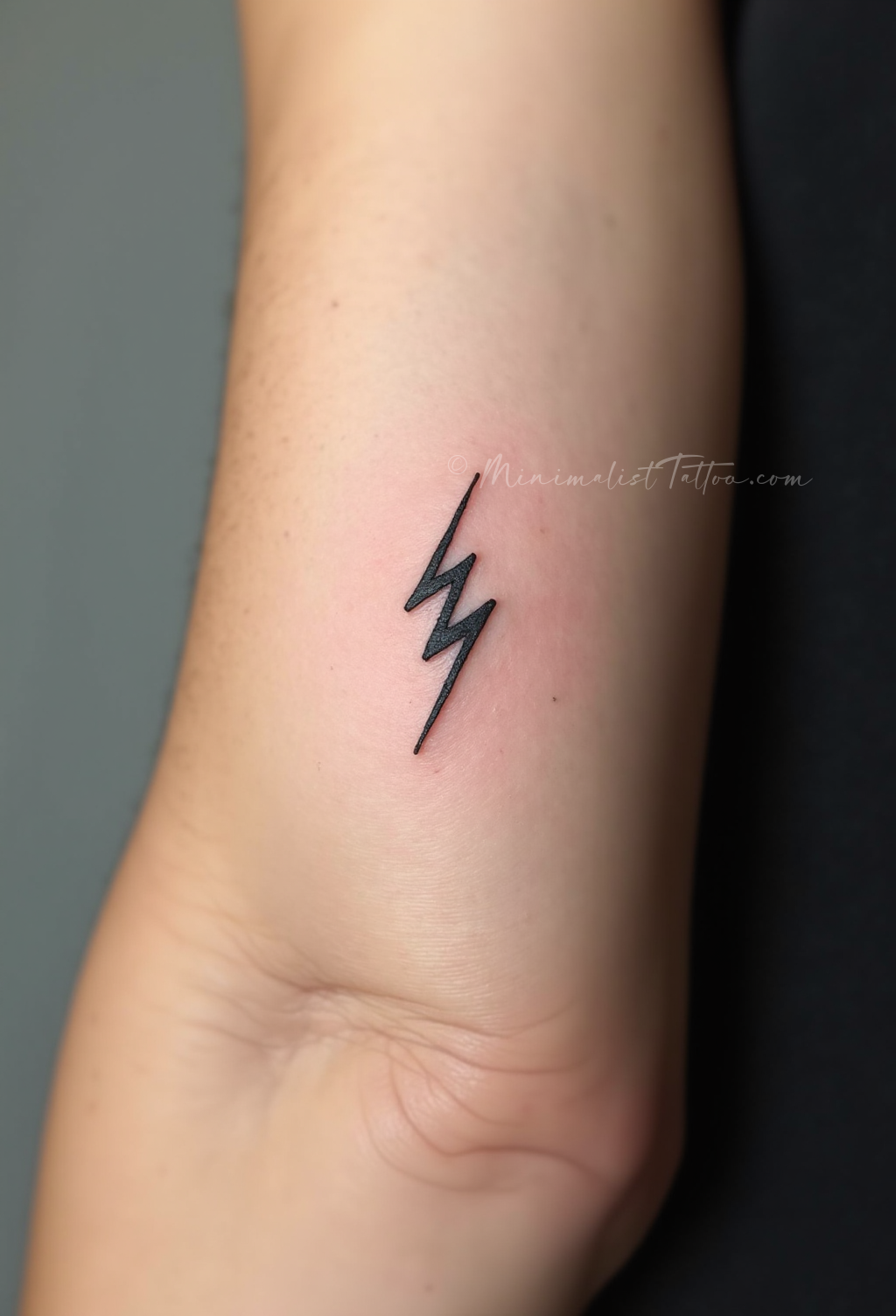 Small lightning bolt tattoo